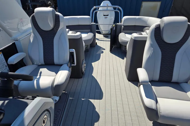 Slide: The Image of Luxurious seating on 2025 Godfrey Monaco 255 SB pontoon boat, featuring modern design and comfort. - 15