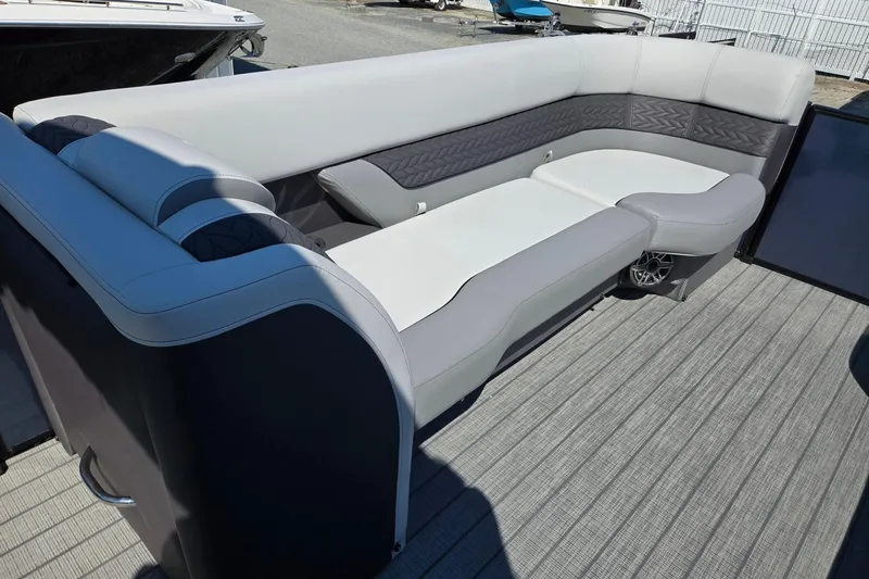 Slide: The Image of Luxurious seating on 2025 Godfrey Monaco 255 SB pontoon boat, featuring modern design and comfort. - 36