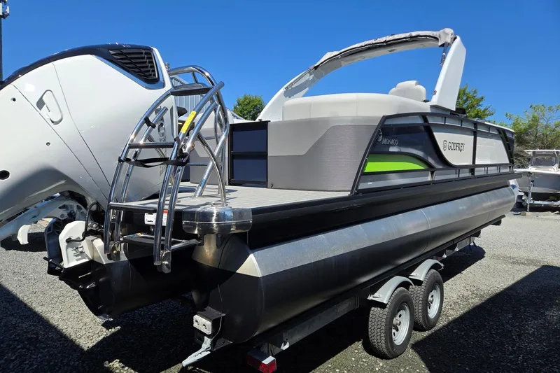 Slide: The Image of 2025 Godfrey Monaco 255 SB pontoon boat on trailer, rear view, sunny day. - 5