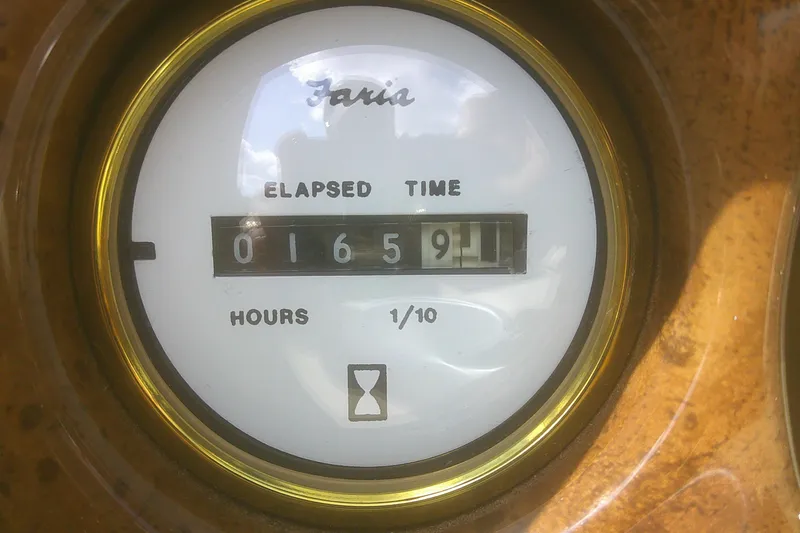 Slide: The Image of 1997 Mariah Z 210 Shabah hour meter showing 165.9 elapsed hours. - 10