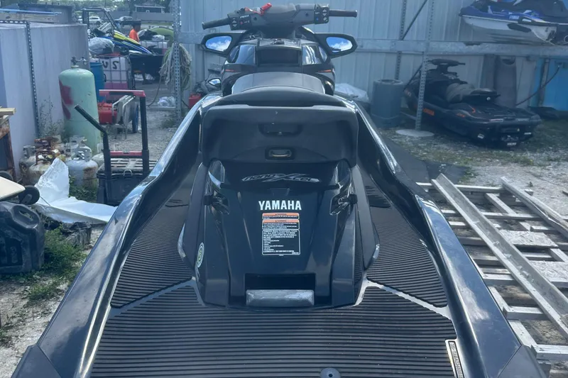 Slide: The Image of 2016 Yamaha WaveRunner FX HO jet ski in storage yard. - 4