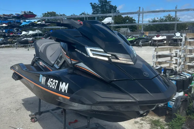 Slide: The Image of 2016 Yamaha WaveRunner FX HO jet ski parked outdoors on a sunny day. - 5