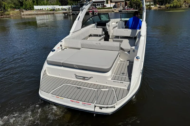 Slide: The Image of Sea Ray SDX 270 boat on calm water, 2026 model. - 3