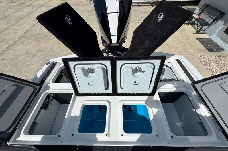 Slide: The Image of Open storage compartments on 2026 iKon VLE20 boat, showcasing spacious design and functionality. - 11