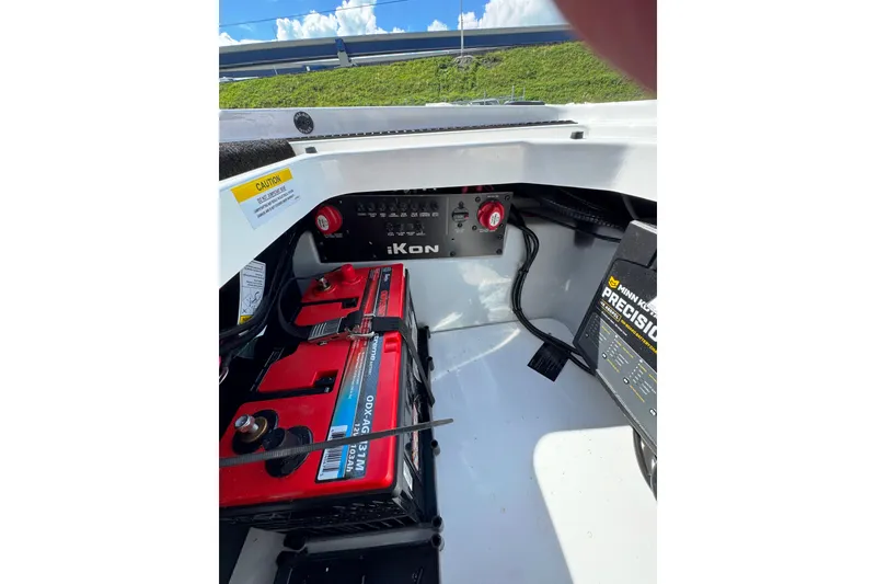 Slide: The Image of Interior of 2026 iKon VLE20 showing battery and control panel setup. - 16