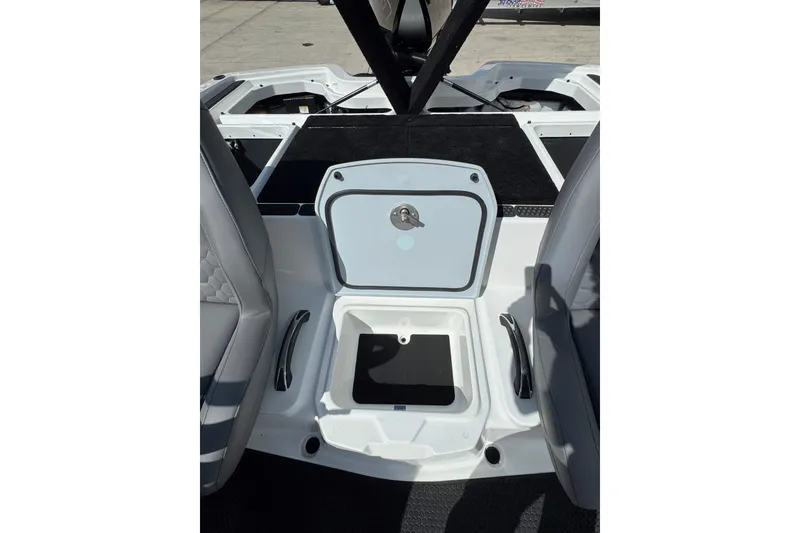 Slide: The Image of Interior view of 2026 iKon VLE20 boat with open storage compartment. - 24