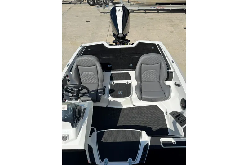 Slide: The Image of 2026 iKon VLE20 boat interior with dual gray seats and steering wheel. - 8