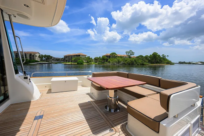 Slide: The Image of Sabre 66 SANDCRAB - Aft Deck Seating & Table - 48