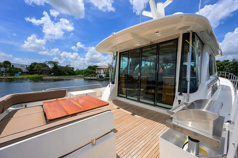 Slide: The Image of Sabre 66 SANDCRAB - Aft Deck Seating & Salon Entrance - 52