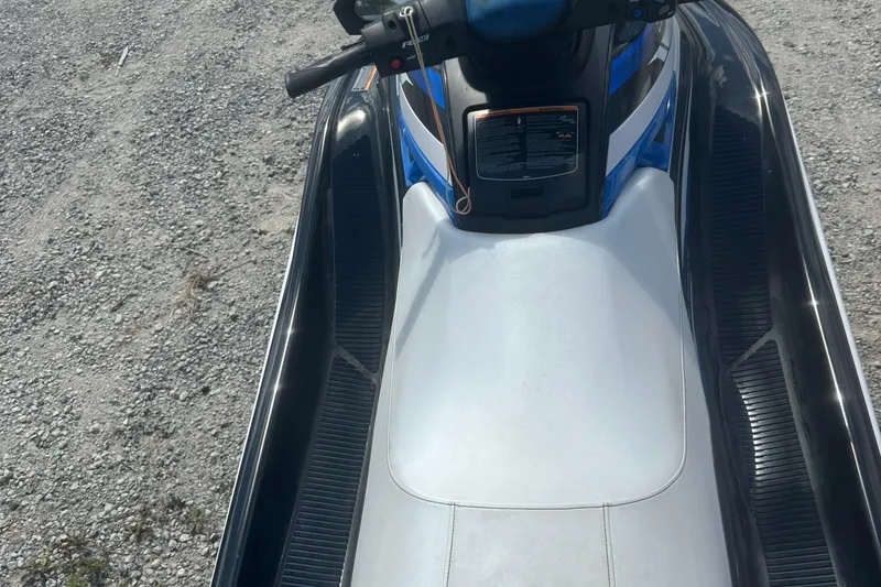 Slide: The Image of 2019 Yamaha WaveRunner VX Deluxe on gravel surface, top view of seat and handlebars. - 10