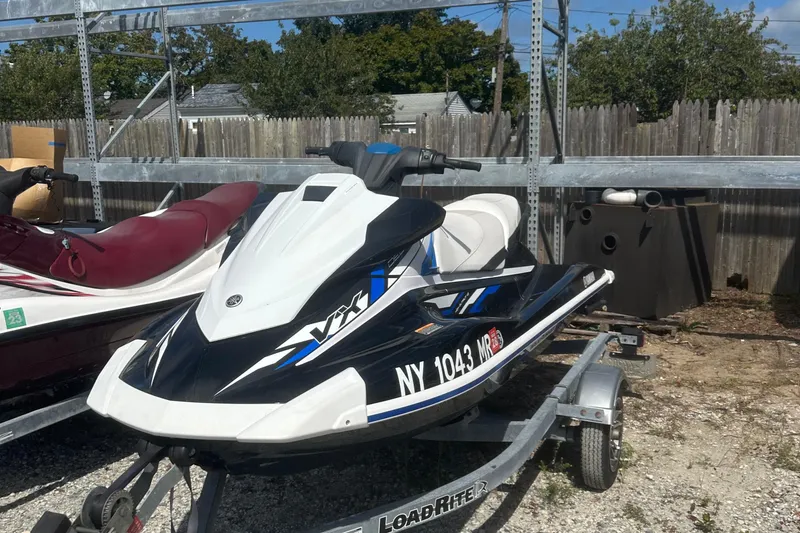 Slide: The Image of 2019 Yamaha WaveRunner VX Deluxe on trailer, parked outdoors. - 3