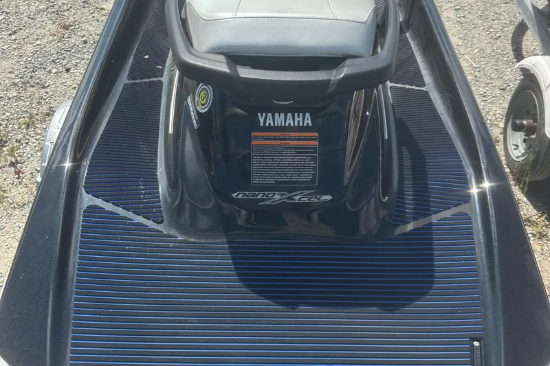 Slide: The Image of 2019 Yamaha WaveRunner VX Deluxe jet ski on gravel surface. - 8