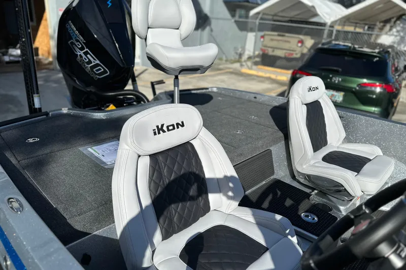 Slide: The Image of 2026 iKon LXE21 boat interior with stylish seating and powerful engine. - 9