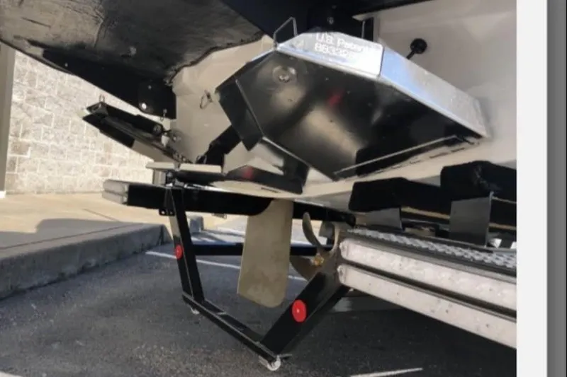 Slide: The Image of 2019 MasterCraft XT25 boat underside with trailer and propeller detail. - 5