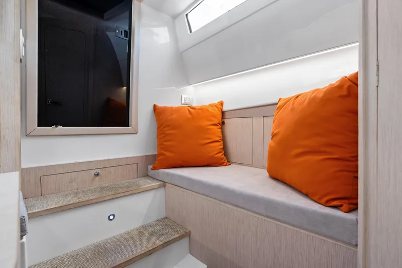 Slide: The Image of Interior of 2021 Magazzu TARGA 45 with orange cushions and modern design. - 14