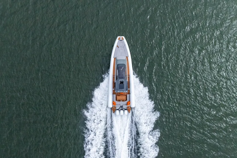 Slide: The Image of Aerial view of 2021 Magazzu TARGA 45 boat cruising on water. - 3