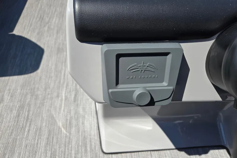 Slide: The Image of Close-up of Wet Sounds audio control on 2026 Harris Cruiser 230 boat. - 17