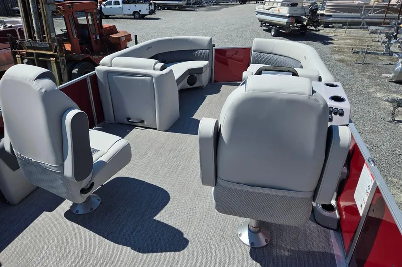 Slide: The Image of 2026 Harris Cruiser 230 pontoon boat interior with plush seating and modern design. - 30
