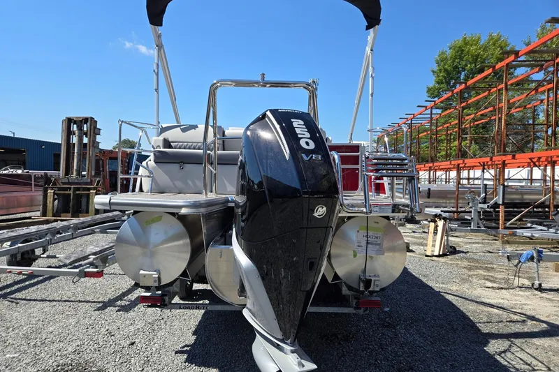Slide: The Image of 2026 Harris Cruiser 230 pontoon boat with powerful 250 V8 engine, parked outdoors. - 4