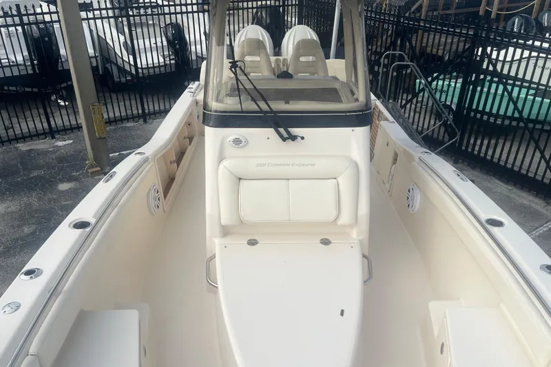 Slide: The Image of 2023 Grady-White 281 Coastal Explorer boat, featuring spacious seating and sleek design. - 8