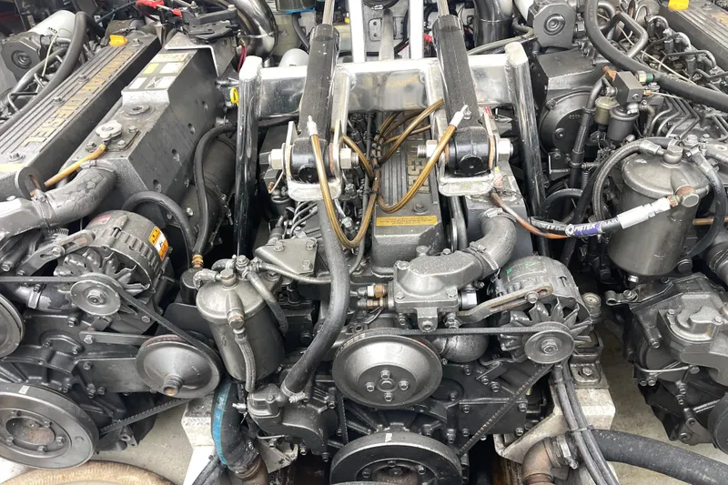 Slide: The Image of Engine of a 1998 Nor-Tech 5000V Diesel boat, showcasing intricate mechanical components. - 40