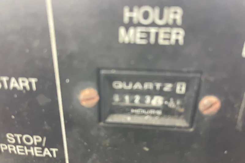 Slide: The Image of Hour meter display on 1998 Nor-Tech 5000V Diesel, showing 1238 hours. - 43