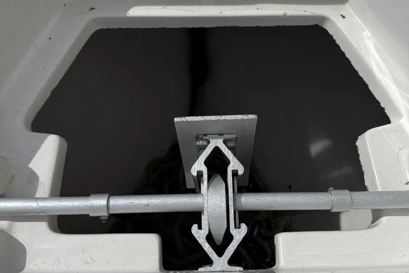 Slide: The Image of Anchor locker of a 2007 Jupiter 31 boat with metal pulley system. - 22