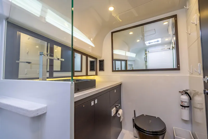 Slide: The Image of Luxurious bathroom in 2019 Palm Beach Motor Yachts GT50, featuring modern fixtures and sleek design. - 47