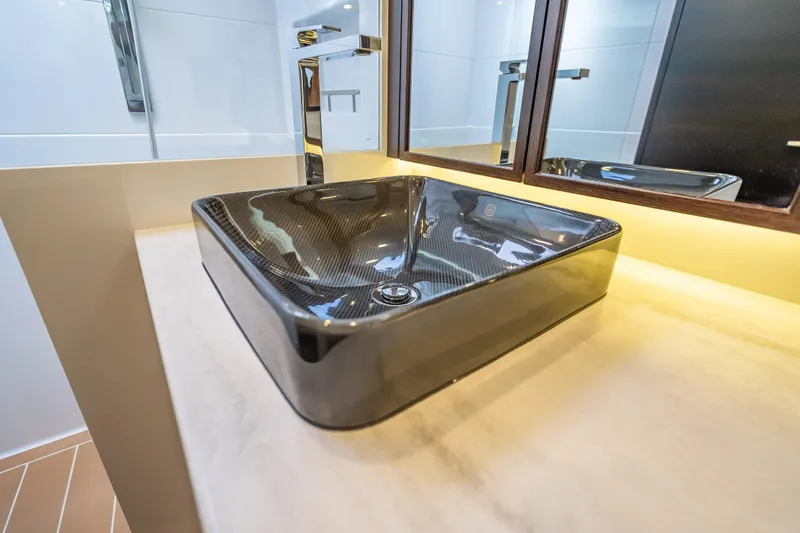 Slide: The Image of Luxurious bathroom sink in 2019 Palm Beach Motor Yachts GT50. - 49