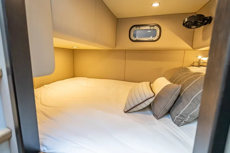 Slide: The Image of Luxurious cabin interior of 2019 Palm Beach Motor Yachts GT50 with cozy bedding. - 52