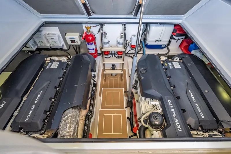 Slide: The Image of Engine room of 2019 Palm Beach Motor Yachts GT50 with Volvo Penta engines. - 56