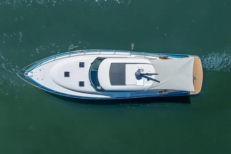 Slide: The Image of Aerial view of 2019 Palm Beach Motor Yachts GT50 on calm water. - 60
