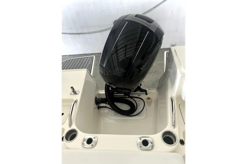 Slide: The Image of 2016 Striper 200 Walkaround boat with a black Mercury outboard motor. - 4