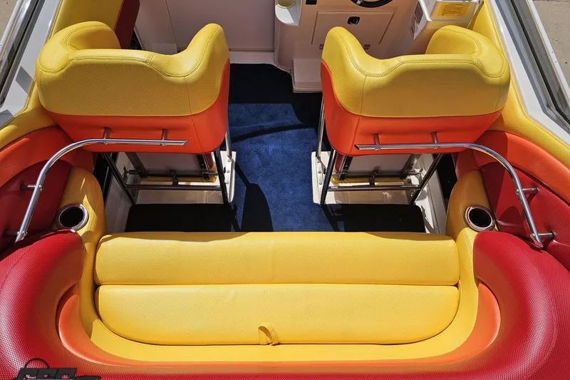 Slide: The Image of Interior of 1995 Wellcraft 29 Scarab boat with vibrant yellow and red seating. - 46
