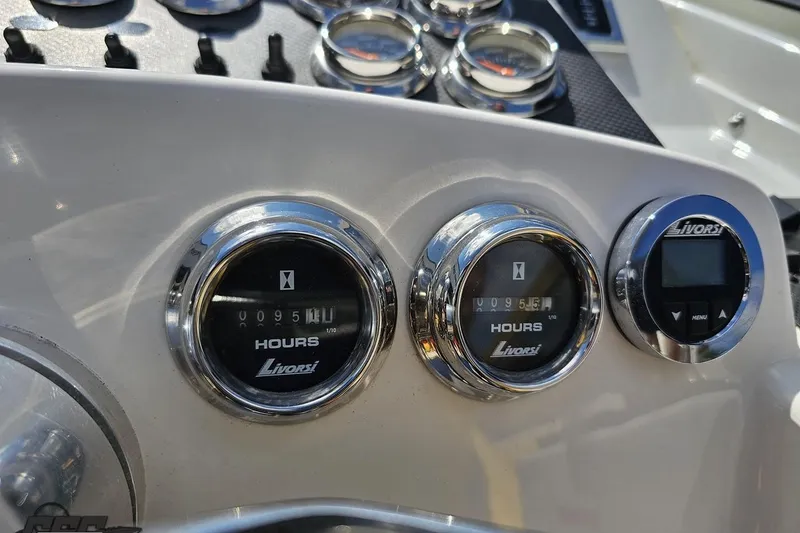 Slide: The Image of Dashboard of a 1995 Wellcraft 29 Scarab boat with Livorsi hour meters. - 65