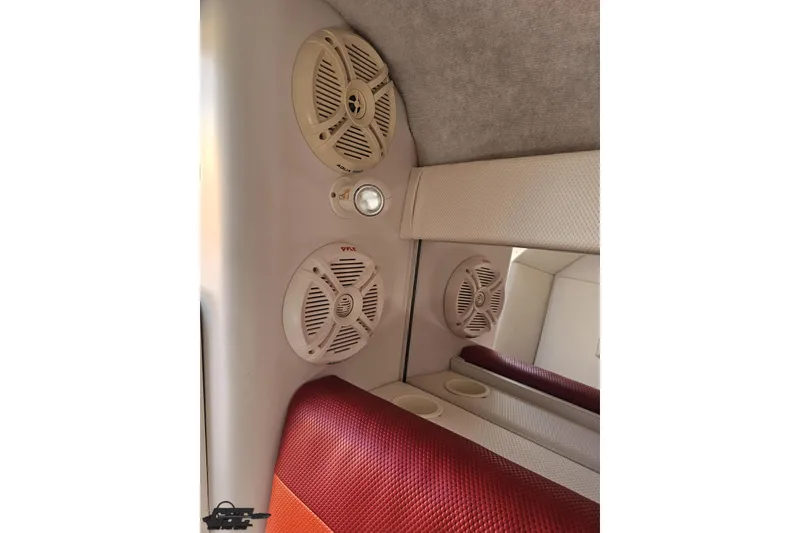 Slide: The Image of Interior speakers of a 1995 Wellcraft 29 Scarab boat, featuring modern audio equipment. - 83