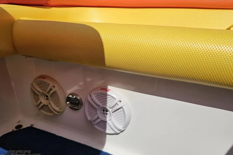 Slide: The Image of Speakers on 1995 Wellcraft 29 Scarab boat with yellow upholstery. - 94