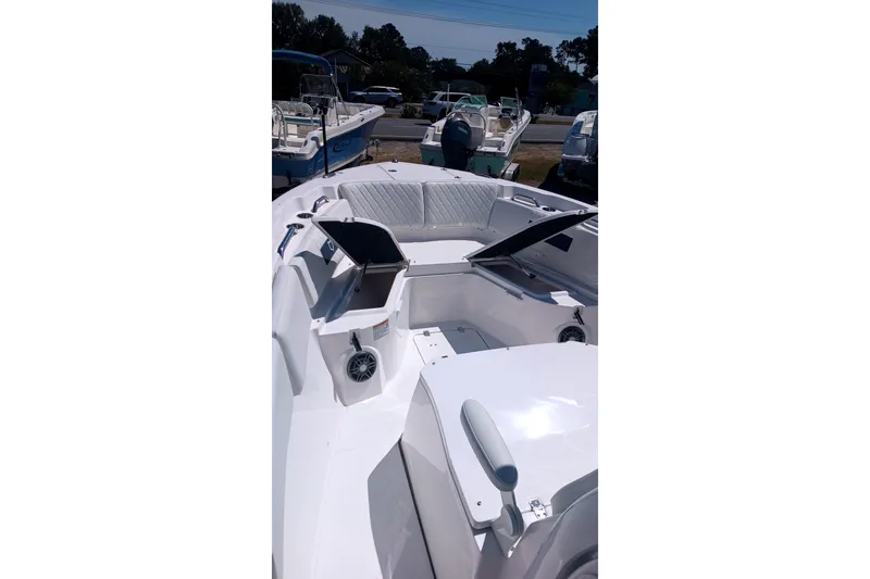 Slide: The Image of 2025 Sea Fox 268c Commander boat interior with seating and storage compartments. - 7