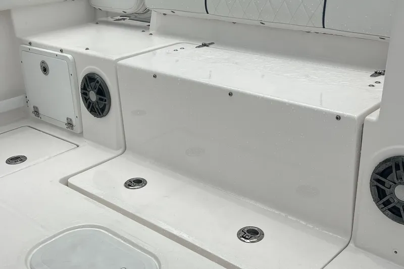 Slide: The Image of 2025 Sea Fox 268c Commander boat interior with seating and storage compartments. - 13