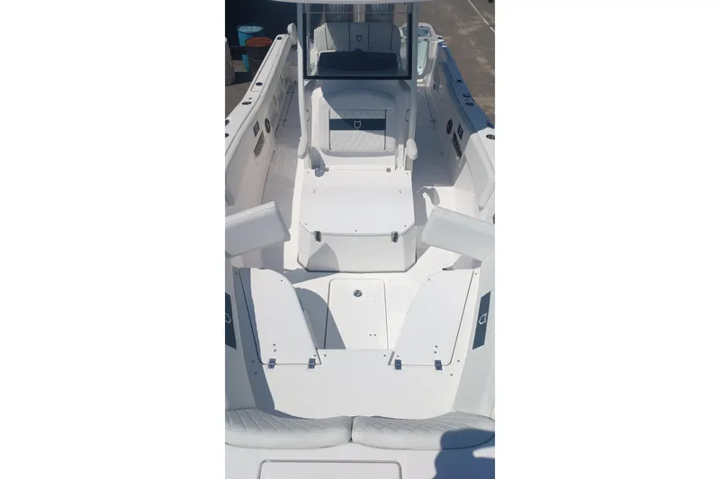 Slide: The Image of 2025 Seafox 268c Commander boat interior, featuring sleek white seating and modern design. - 3