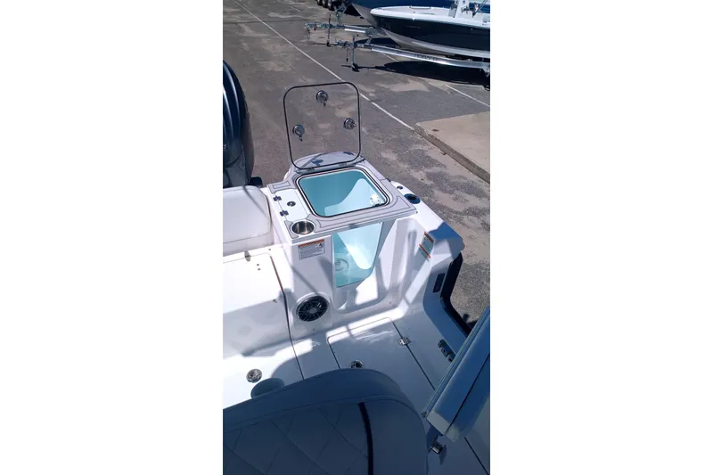 Slide: The Image of 2025 Sea Fox 268c Commander boat interior with open storage compartment. - 4