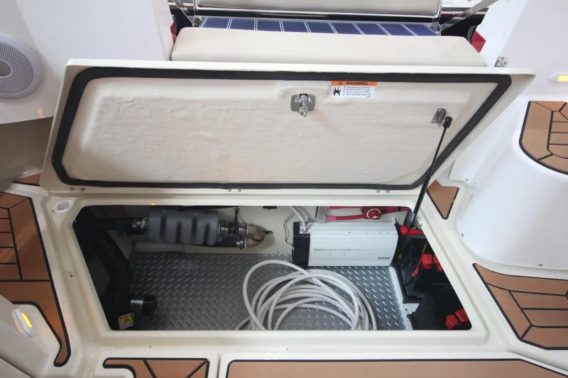 Slide: The Image of Open storage compartment in 2026 Ranger Tugs R-31 Command Bridge Luxury Edition boat. - 21