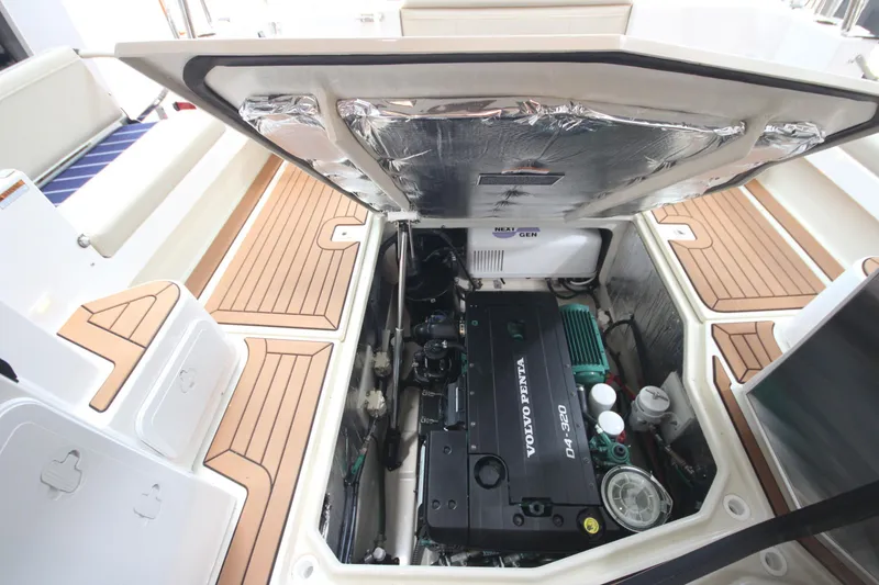 Slide: The Image of Engine compartment of 2026 Ranger Tugs R-31 Command Bridge Luxury Edition with Volvo Penta engine. - 23