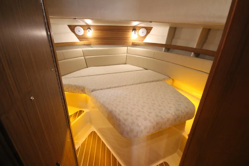 Slide: The Image of Luxurious interior cabin of 2026 Ranger Tugs R-31 Command Bridge, featuring elegant lighting and seating. - 62