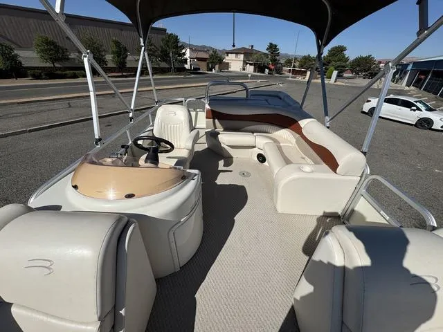 Slide: The Image of 2007 Bennington 2275 GL pontoon boat with spacious seating and canopy. - 17