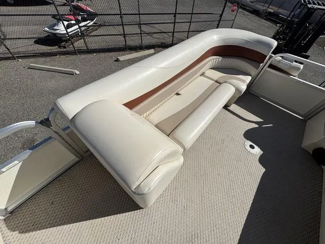 Slide: The Image of 2007 Bennington 2275 GL pontoon boat with beige seating and brown accents. - 19