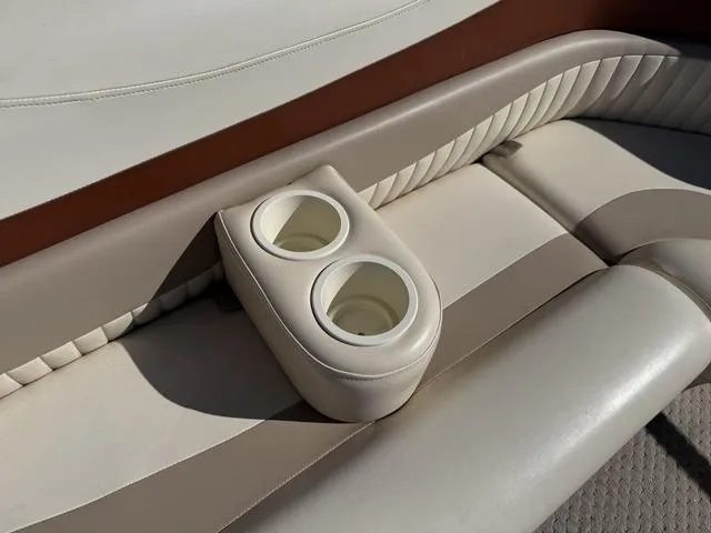 Slide: The Image of 2007 Bennington 2275 GL boat seat with built-in cup holders. - 28