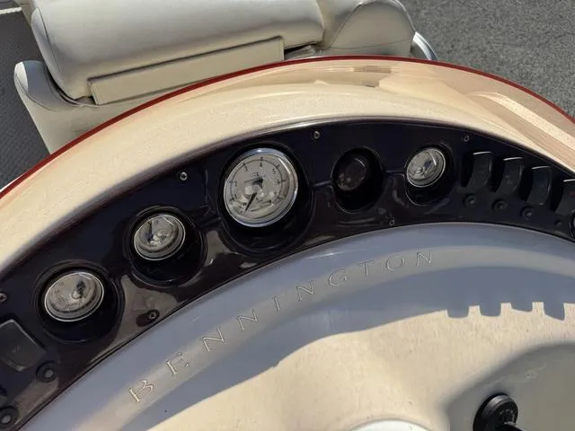 Slide: The Image of Dashboard of a 2007 Bennington 2275 GL boat with gauges and controls. - 32