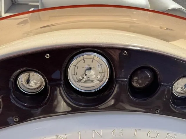 Slide: The Image of Dashboard of a 2007 Bennington 2275 GL boat with RPM gauge and controls. - 34