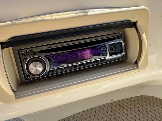 Slide: The Image of Kenwood stereo system in a 2007 Bennington 2275 GL boat dashboard. - 36